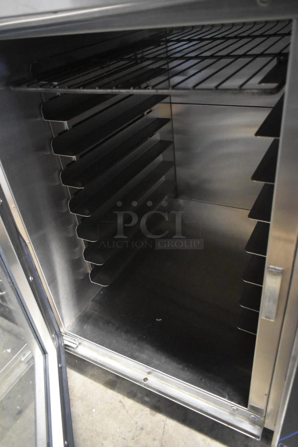 Moffat E89AMS Turbofan stainless steel proofer cabinet, interior racks visible, commercial-grade, open door view.