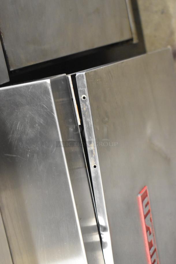Vulcan VSX24G stainless steel commercial steam cabinet, natural gas, 2 decks, 200,000 BTU, minor surface wear visible.