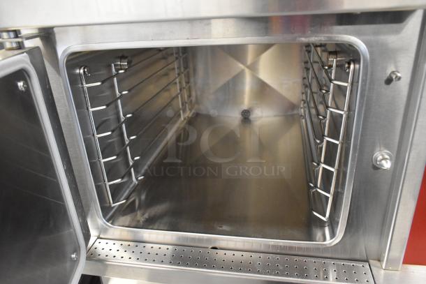 Vulcan VSX24G stainless steel commercial steam cabinet interior, natural gas, 2 decks, 200,000 BTU. Clean and spacious.