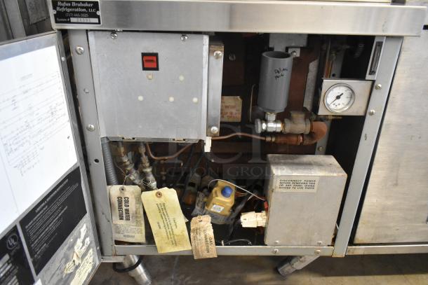 Vulcan VSX24G stainless steel 2-deck steam cabinet. Natural gas, 200,000 BTU. Tags visible for cold water and gas connection.
