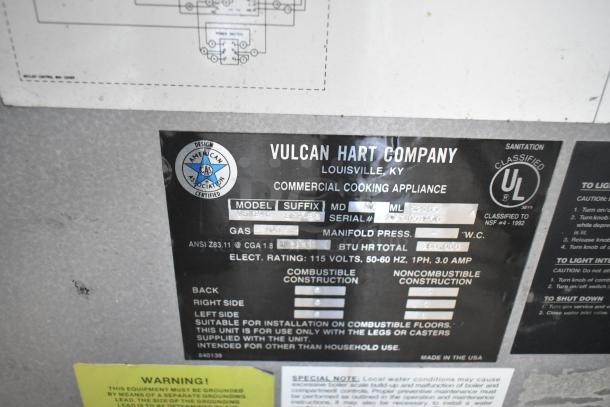 Vulcan VSX24G stainless steel commercial steam cabinet label, 200,000 BTU, natural gas, UL certified, model and serial details.