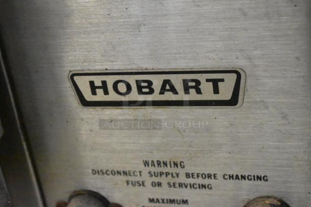Hobart stainless steel convection oven label, warning to disconnect supply before servicing. Electric, 208/240V, 1 phase.