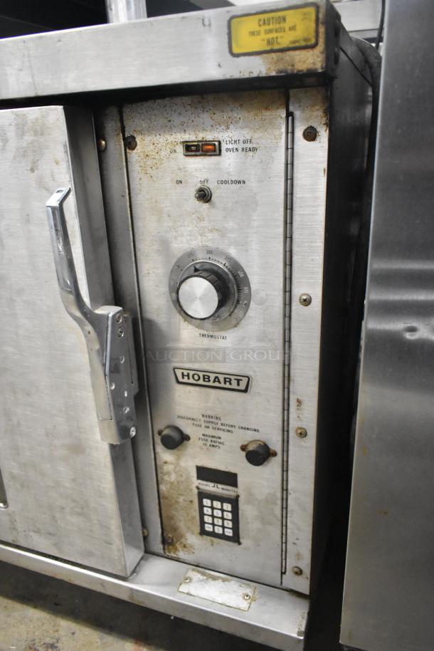 Hobart stainless steel half-size convection oven, electric-powered, view-through door, 208/240 volts, 1 phase, used condition.