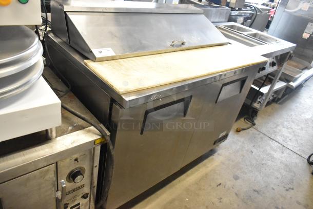 True TSSU-48-12 stainless steel prep table with bain marie top, on casters. 115 volts, 1 phase, commercial use.