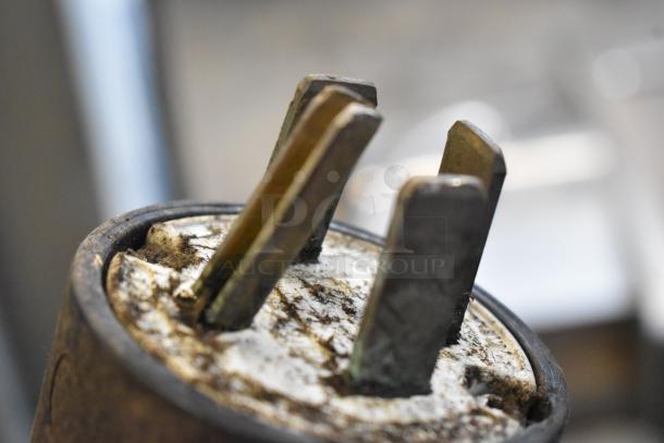 Close-up of a slightly corroded power plug from a Taylor PH61-33 Soft Serve Ice Cream Machine.