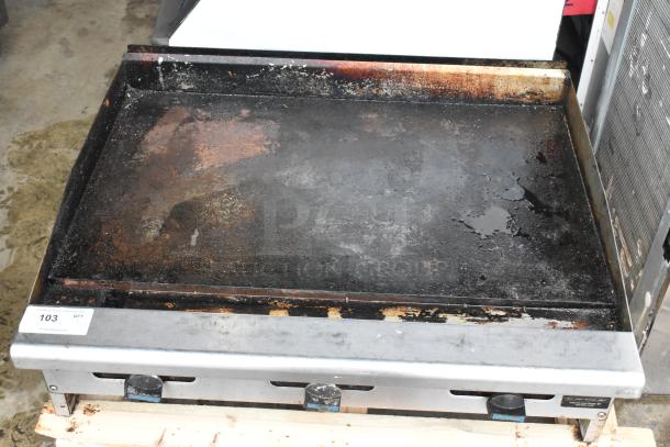 Radiance stainless steel commercial flat top griddle, countertop model, used condition with surface wear. Item tag: 103.