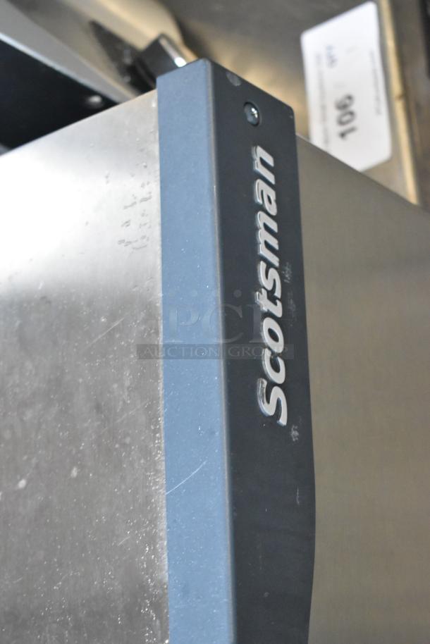 Scotsman C1030MA-32B Prodigy Plus stainless steel ice machine, medium cube, 1077 lb capacity, brand marked, in good condition.