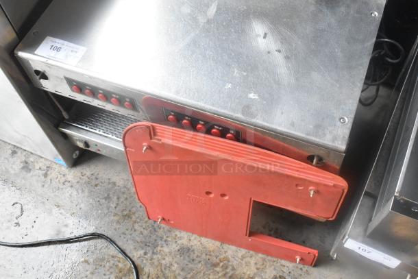 Conti Club stainless steel commercial countertop espresso machine with red front panel, visible buttons, and auction tag.