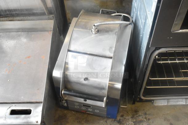 Electrolux HSSPAN stainless steel commercial Panini press, 208V, 1 Phase. Features digital controls. Model label visible.