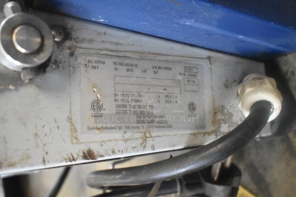Electrolux HSSPAN stainless steel panini press label, showing model, voltage, certification marks, and condition.