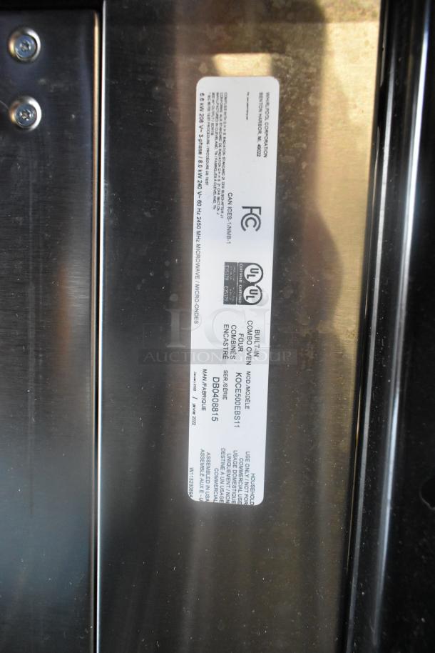 KitchenAid KOCE500EBS11 stainless steel wall mount combo convection oven label, shows model and voltage details.