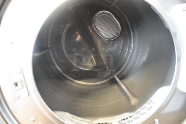 Samsung DVE45B6300P front load dryer interior view, metal drum, 120/240V, 1 Phase, excellent condition.