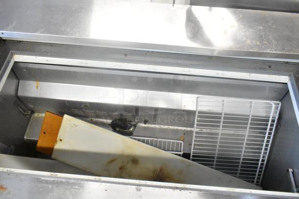 SLMPREP-2DW Stainless Steel Commercial Sandwich Prep Table, Bain Marie Mega Top, 115V, 1 Phase, visible wear and dirt.