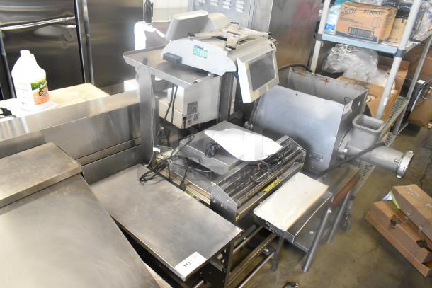 Mettler Toledo 0662 Metal Commercial Floor Style Wrapping Station in used condition. Features stainless steel surfaces and digital controls.