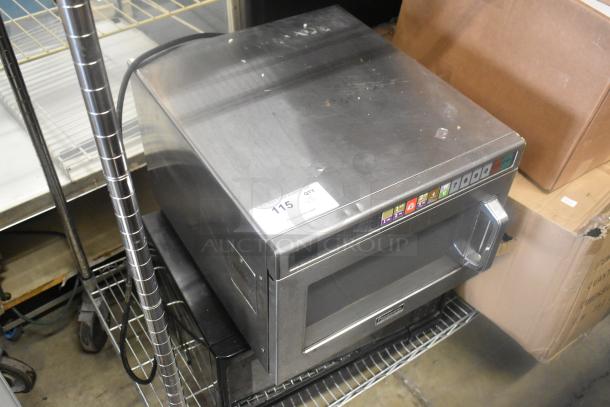 Panasonic NE-1757R commercial microwave oven, stainless steel, button controls, moderate wear, auction label "115 QTY 2".