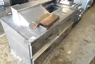 Delfield UCD4464N-12-DD5 Stainless Steel Prep Table with 4 Drawers. Missing one lid. 115V, 1 Phase. Used condition.