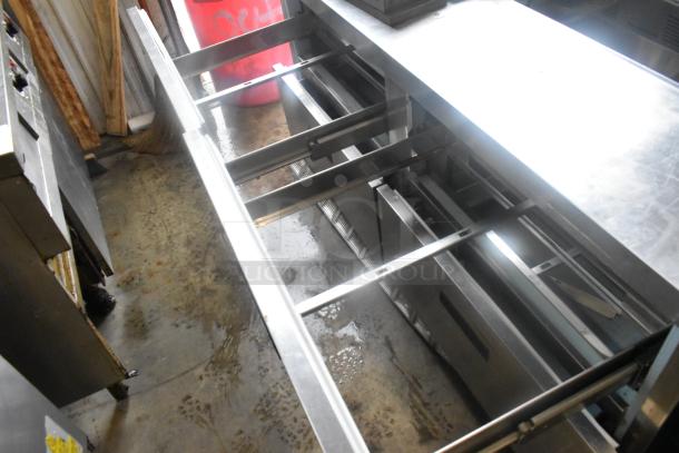 Delfield UCD4464N-12-DD5 stainless steel prep table with 4 drawers, missing one lid, 115V, 1 phase.