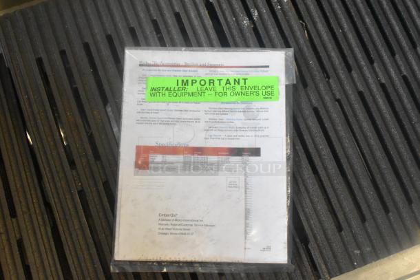 EmberGlo Stainless Steel Commercial Charbroiler Grill; includes owner's instructions and specifications in a plastic sleeve.