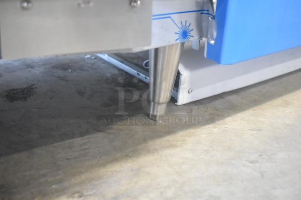 EmberGlo stainless steel commercial countertop charbroiler grill, close-up of sturdy leg, indicating durable construction.