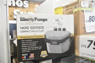Brand new Liberty Pumps 406 Compact Automatic Drain Pump with float switch, 1/6 hp, 115V, scratch and dent condition.