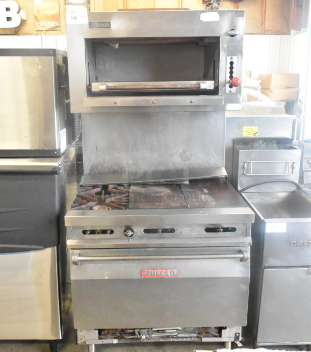 Vulcan stainless steel commercial gas griddle with 2-burner range, oven, and salamander cheese melter in used condition.