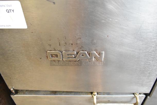 Dean SR142GN stainless steel deep fat fryer, natural gas, 105,000 BTU, visible wear, branding etched on surface.