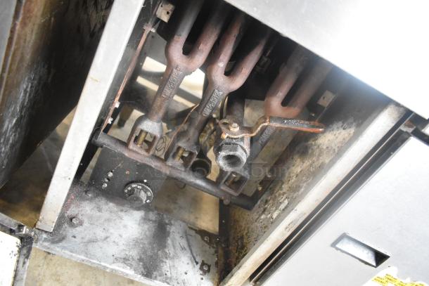 Dean SR142GN stainless steel gas fryer, 105,000 BTU, shows internal components. Used condition with visible wear.