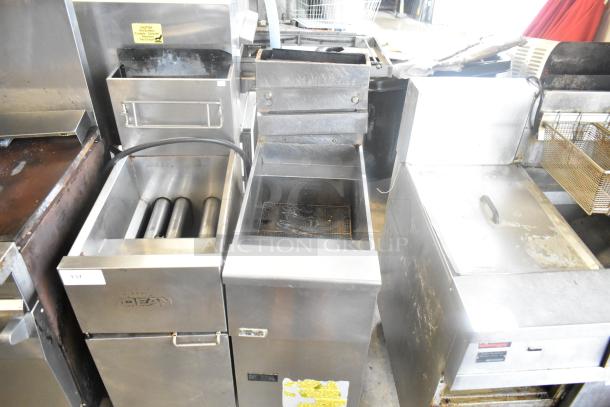 Pitco Frialator SG14 stainless steel natural gas deep fryer, 110,000 BTU, used condition, with caution sticker.