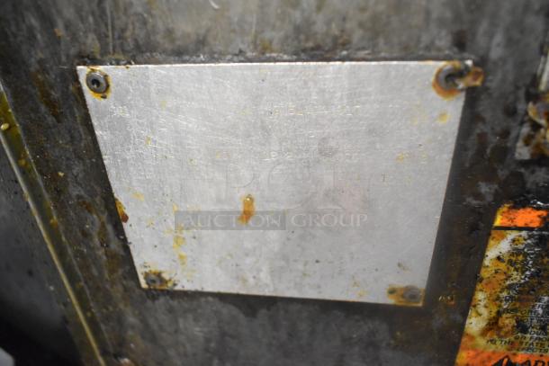 Pitco Frialator SG14 stainless steel commercial deep fat fryer tag, showing model and specifications, some wear visible.