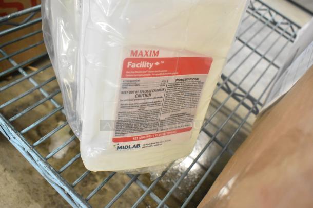 6 bottles of Maxim Facility One Step Disinfectant, 946 mL each, in original packaging. Label indicates disinfectant and deodorizer.