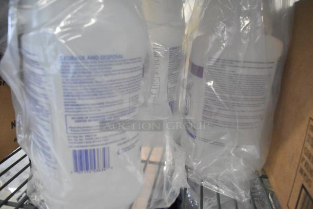 Clear bottles of sanitizer wrapped in plastic, visible labels with instructions, stored on a metal shelf.