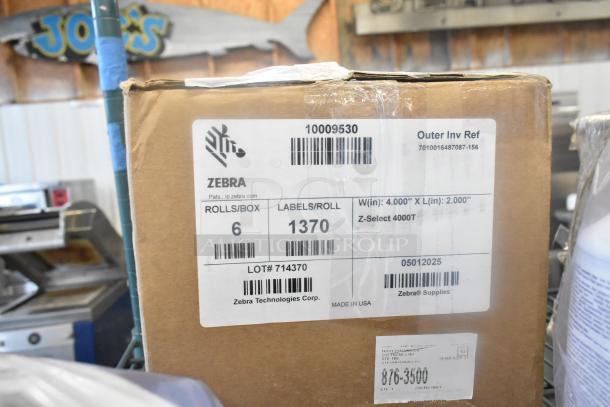 Zebra label box with reference number 10009530; 6 rolls/box, 1370 labels/roll, Z-Select 4000T. Made by Zebra Technologies.