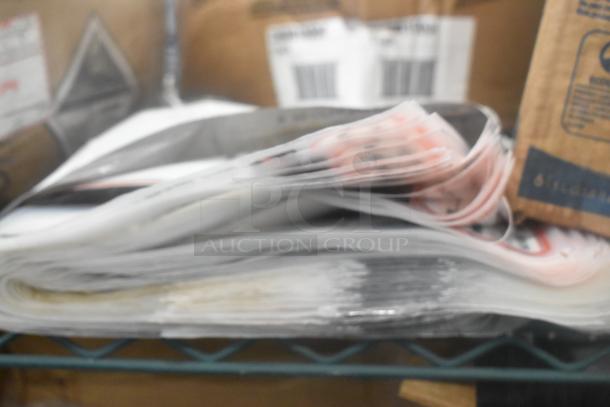Stack of assorted Zebra labels on a shelf, partially wrapped, with blurred background featuring boxes with barcodes.