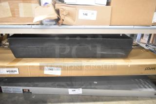 Two various items, including a Safco 5296GR wire shelf in original packaging, visible labels with auction lot numbers.