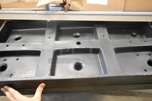 Two items including a black Safco 5296GR wire shelf panel, showing drilled holes and sturdy design.