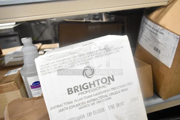 Assorted items including Diversey sanitizer bottle, Zebra resin ribbons, and Foresight carrier screen in packaging.