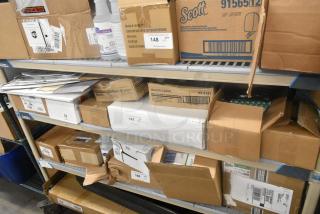 Shelves with 13 items including Zebra labels, Scott box, and Health Gards liners. Boxes show various labels and markings.