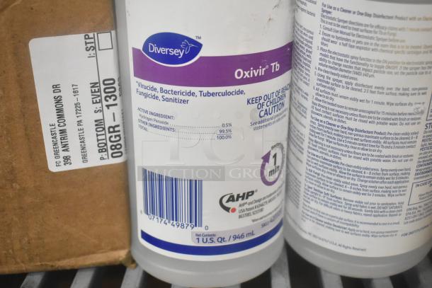 11 various items include Diversey Oxivir Tb sanitizer bottles, crayons, and a Scott dispenser. Bid multiplied by 11. Labels show sanitizer ingredients and usage.