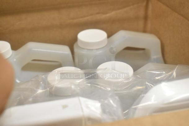 Box of various cleaning supplies with white-capped bottles, possibly including Betco disinfectant. Image shows part of contents.