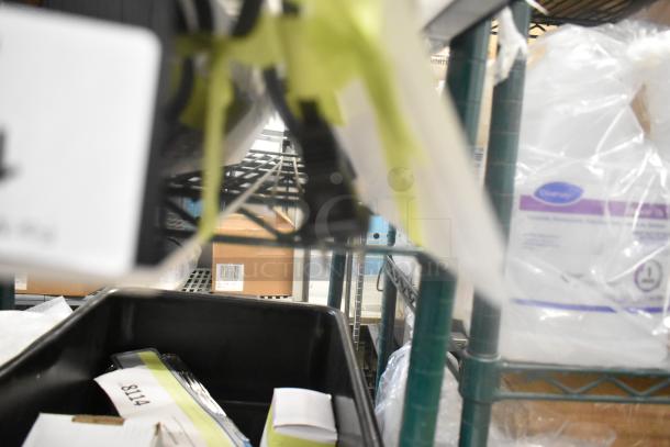 Blurred image of a storage area with shelves and boxed items; the Beverage-Air LBD2-24L display is not visible.