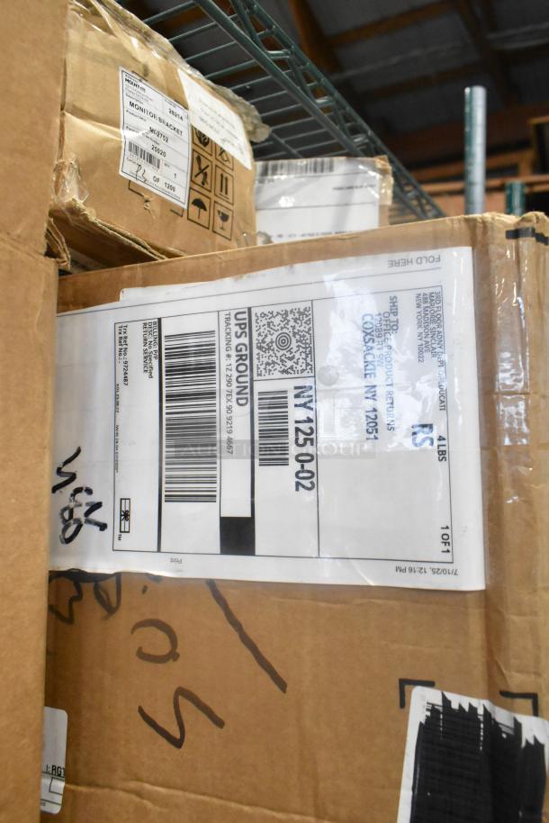 Cardboard boxes labeled with Monitor Bracket and UPS Ground label, part of 13 various items including Coastwide Glass Cleaner.