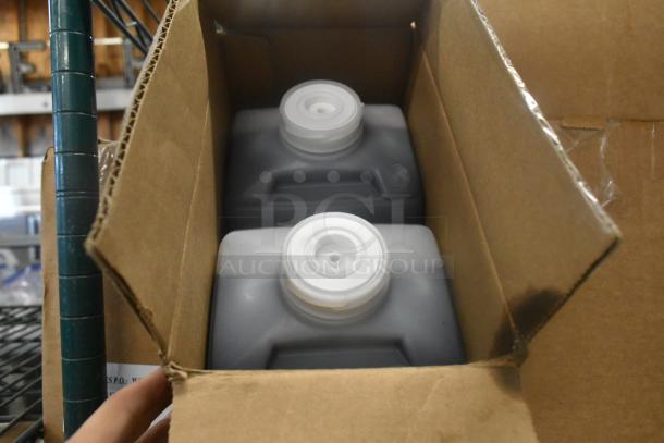 Box containing two bottles of Coastwide Glass Cleaner, unopened, visible cap detail, part of a 13-item auction lot.