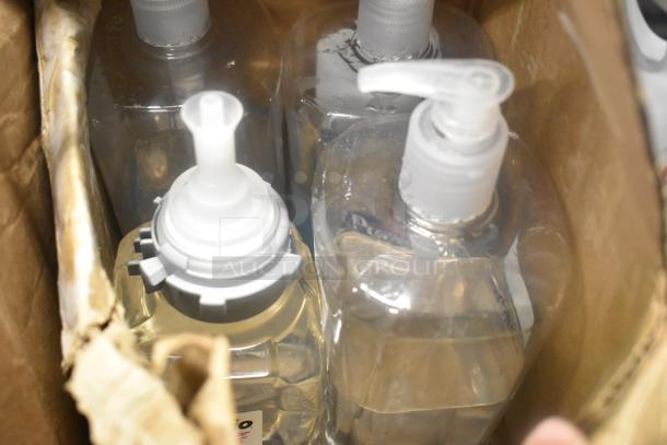 Box with sanitizer bottles, Diversey Oxivir wipes, and Coastwide foam soap. Items may vary.