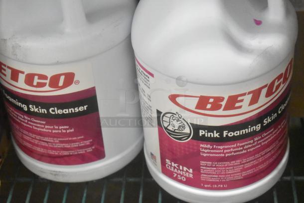 Betco Pink Foaming Skin Cleanser, 1 gal jugs, mildly fragranced, with label details and usage instructions.