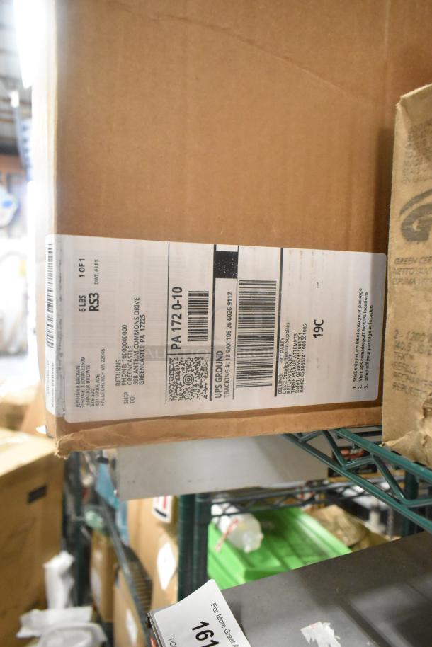 Box containing various items, including Gojo Hand Cleaner. Shipping label shows detail, packaged in good condition.