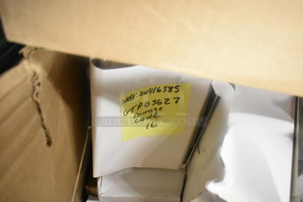 Box with various items, including Cardinal index cards. Yellow tag reads: SKU: 24416585, GTPO5627, Damage code 16.