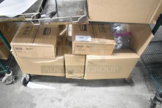 Six boxes of various items, including Rubbermaid Auto Foam, on a cart. Visible label reads "Auto Foam 1100 mL."