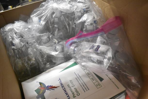 Box containing various items, including Rubbermaid Auto Foam refills, glass cleaner, Purell hand sanitizer, and Hammermill paper. Perfect for bulk purchase.