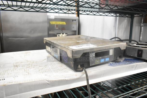 CAS PD-II Metal Countertop Scale, 30 lb capacity. Used condition with visible wear. Includes digital display and operation buttons.