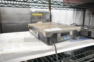 CAS PD-II Metal Countertop Scale, 30 lb capacity. Used condition with visible wear. Includes digital display and operation buttons.